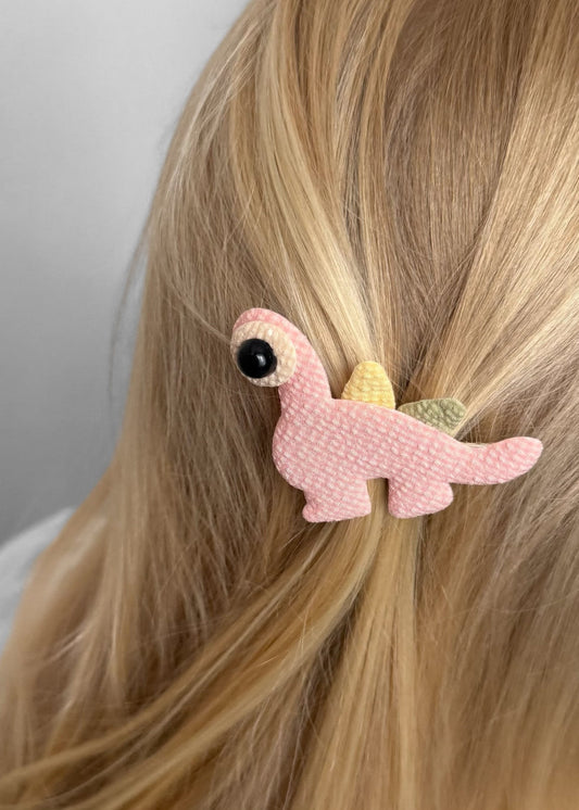 Pinkfarbene Dino-Haarspange – Verspielter prähistorischer Freund