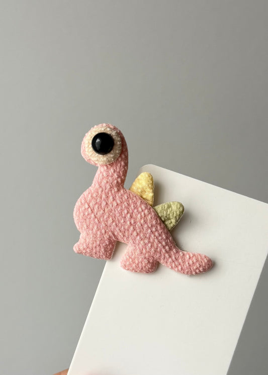 Pinkfarbene Dino-Haarspange – Verspielter prähistorischer Freund