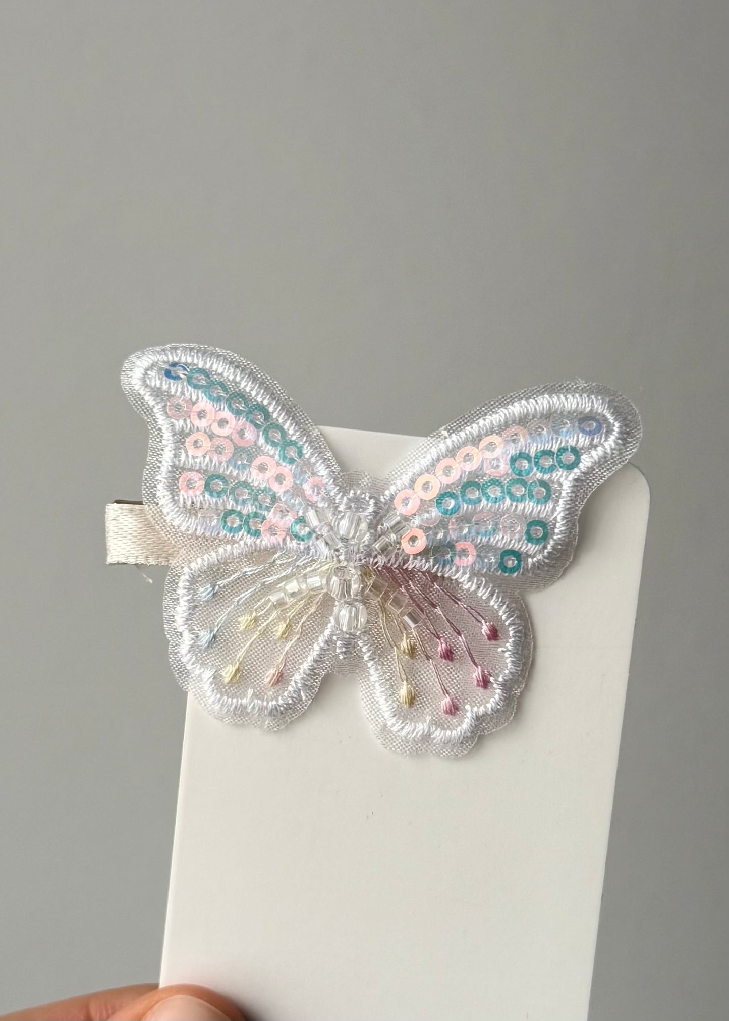 Fermaglio per capelli a farfalla con paillettes – Magia pastello scintillante