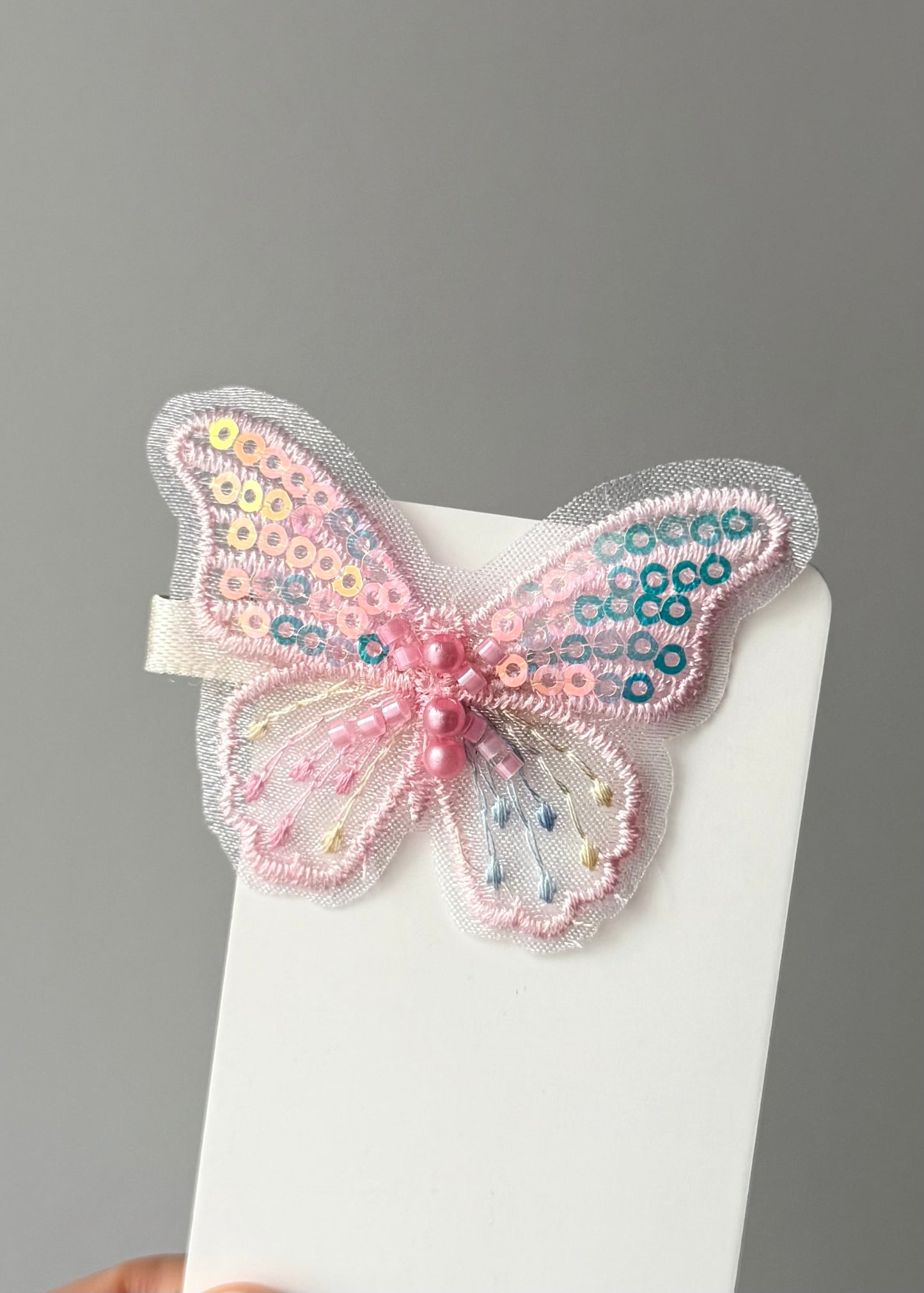 Fermaglio per capelli a farfalla con paillettes – Magia pastello scintillante