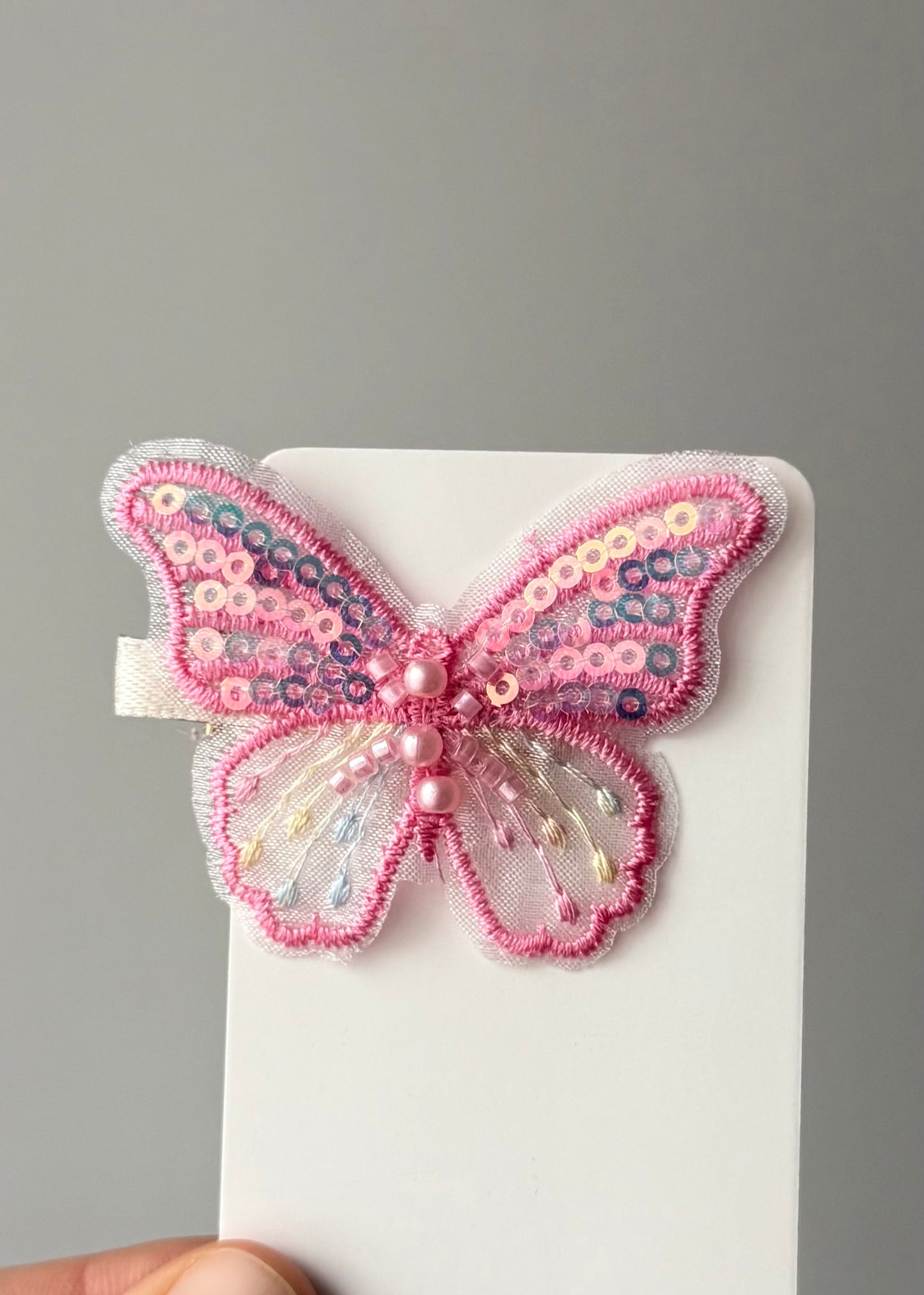Fermaglio per capelli a farfalla con paillettes – Magia pastello scintillante